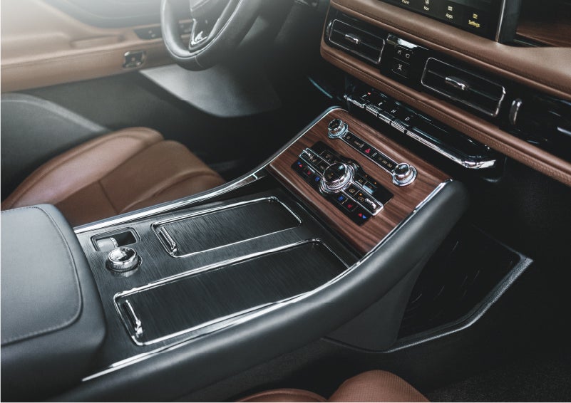 The front center console of a 2023 Lincoln Aviator® SUV is shown in | Rydell Lincoln in Independence IA