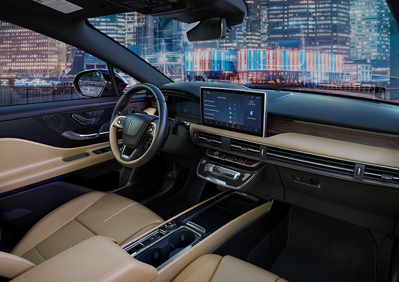 The interior of a 2023 Corsair® SUV shows off ample room and refined styling.