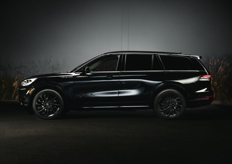 A 2024 Lincoln Aviator® SUV is shown in the Infinite Black exterior color | Rydell Lincoln in Independence IA