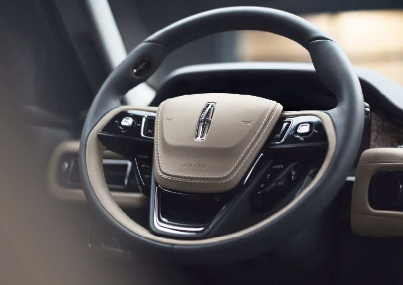 The intuitively placed controls of the steering wheel on a 2024 Lincoln Aviator® SUV | Rydell Lincoln in Independence IA