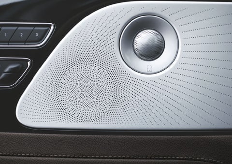 Two speakers of the available audio system are shown in a 2024 Lincoln Aviator® SUV | Rydell Lincoln in Independence IA