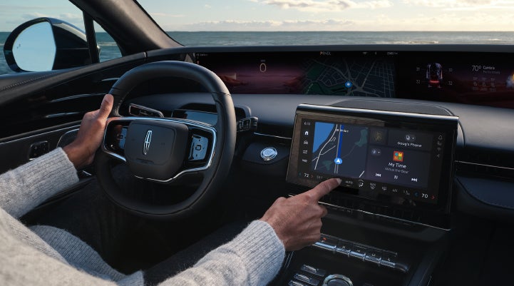 The driver of a 2024 Lincoln Nautilus® SUV interacts with the new Lincoln Digital Experience. | Rydell Lincoln in Independence IA