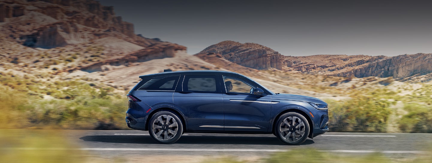 A 2024 Lincoln Nautilus® SUV is being driven in a desert setting. | Rydell Lincoln in Independence IA