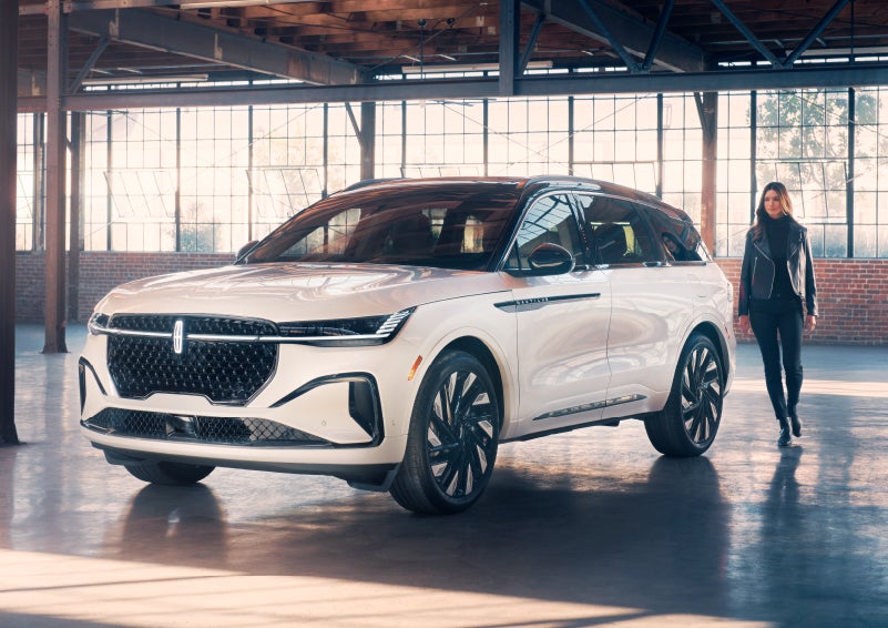 A person approaches a 2024 Lincoln Nautilus® SUV. | Rydell Lincoln in Independence IA