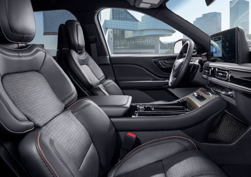 The interior of the 2025 Lincoln Aviator® SUV is shown with sleek black accents. | Rydell Lincoln in Independence IA