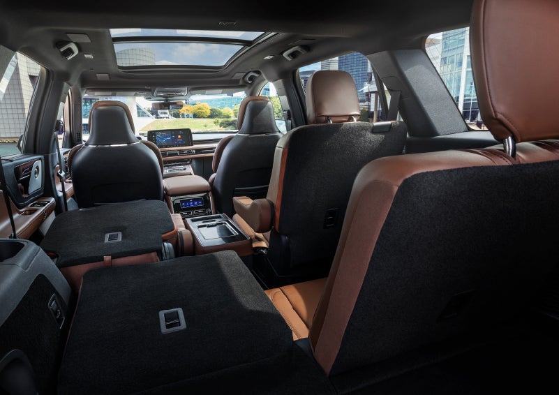 The interior of the 2025 Lincoln Aviator® SUV is shown with two seats folded down for added space. | Rydell Lincoln in Independence IA