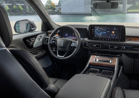 The interior of the 2025 Lincoln Aviator® SUV is shown parked with a view of a harbor through the windshield. | Rydell Lincoln in Independence IA