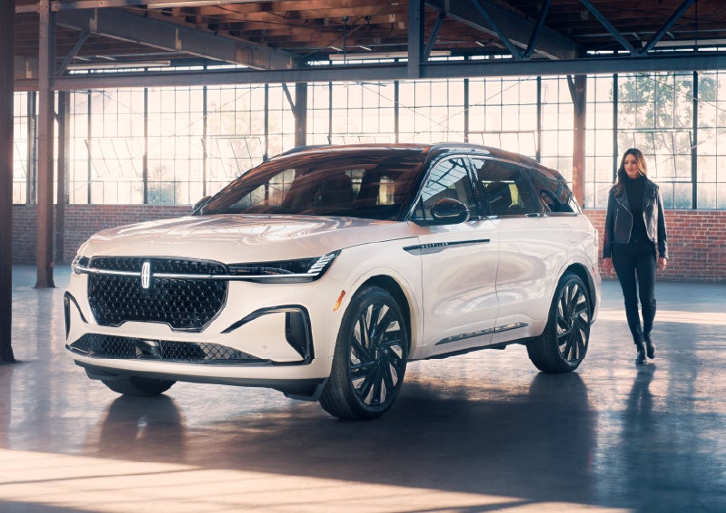 A person approaches a 2025 Lincoln Nautilus® SUV. | Rydell Lincoln in Independence IA