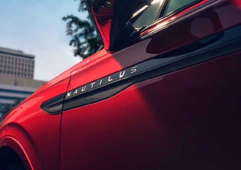 A side badge on the passenger door reads Nautilus. | Rydell Lincoln in Independence IA