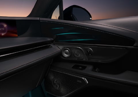 Selectable ambient lighting glows in the passenger door panel. | Rydell Lincoln in Independence IA